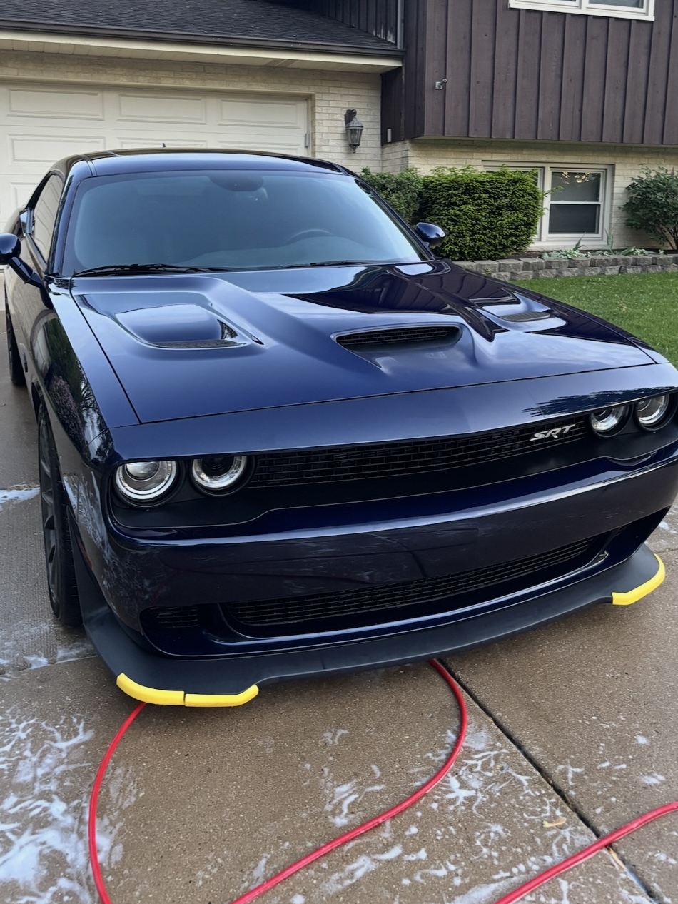 Dark blue Dodge Challenger SRT after a full exterior detail, glossy paint