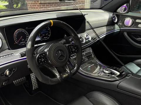 Mercedes-AMG interior with black leather seats and steering wheel after a detail