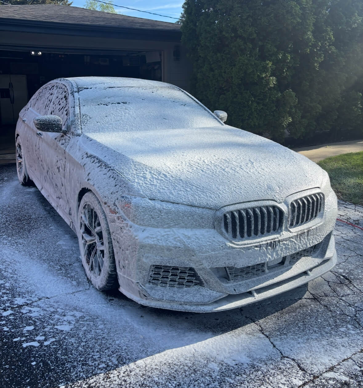 BMW covered in snow foam during paint decontamination, Arlington Heights